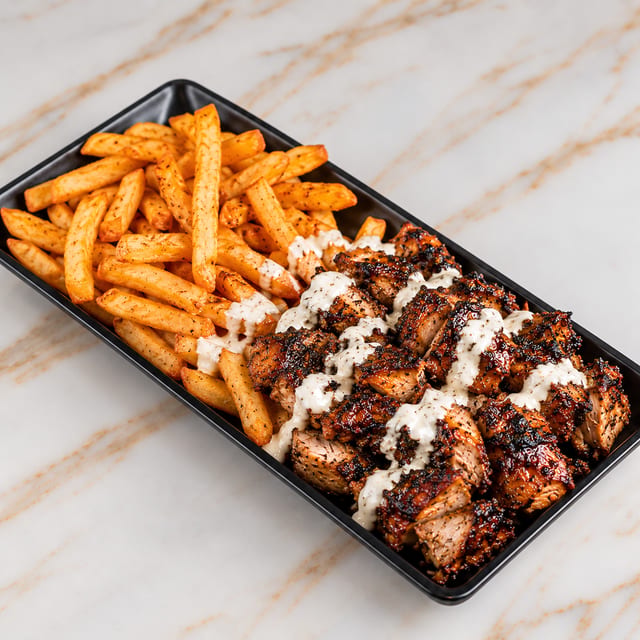 Jerk Chicken over Fries.