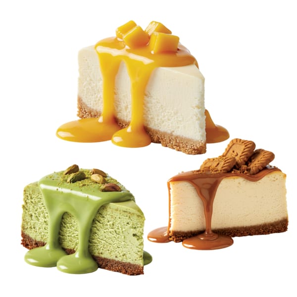 Three cheesecake slices: mango, pistachio, and caramel with Lotus Biscoff cookies, on a white background.