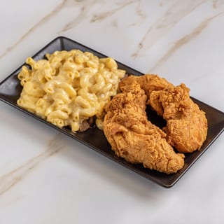 Fried Tender Over Mac & Cheese